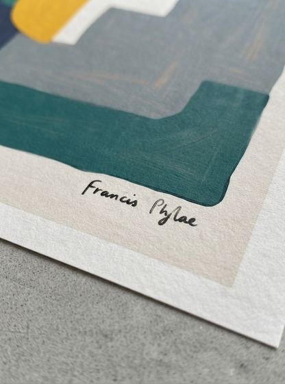 Close-up of an Bauhaus Abstract Geometric Wall Poster featuring aesthetic minimal block print art with architectural forms by Francis Phylae at Phylae Posters, on textured paper, featuring geometric shapes in teal, gray, cream, and yellow, with the signature 'Francis Phylae' written in black ink on a gray surface.