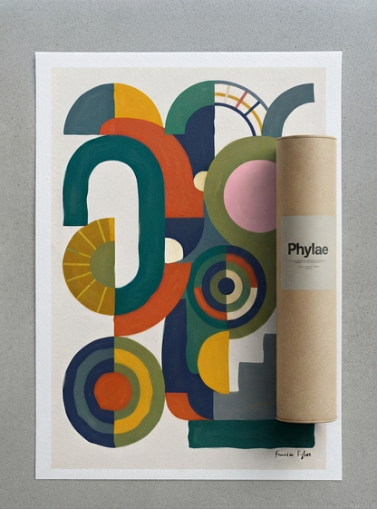 An Bauhaus Abstract Geometric Wall Poster with bold color block art print inspired by original acrylic artwork from Francis Phylae for Phylae Poster featuring mid-century modern geometric shapes in teal, orange, yellow, green, and pink on an off-white background, shown next to a brown kraft paper cylinder labeled 'Phylae' on a gray surface.