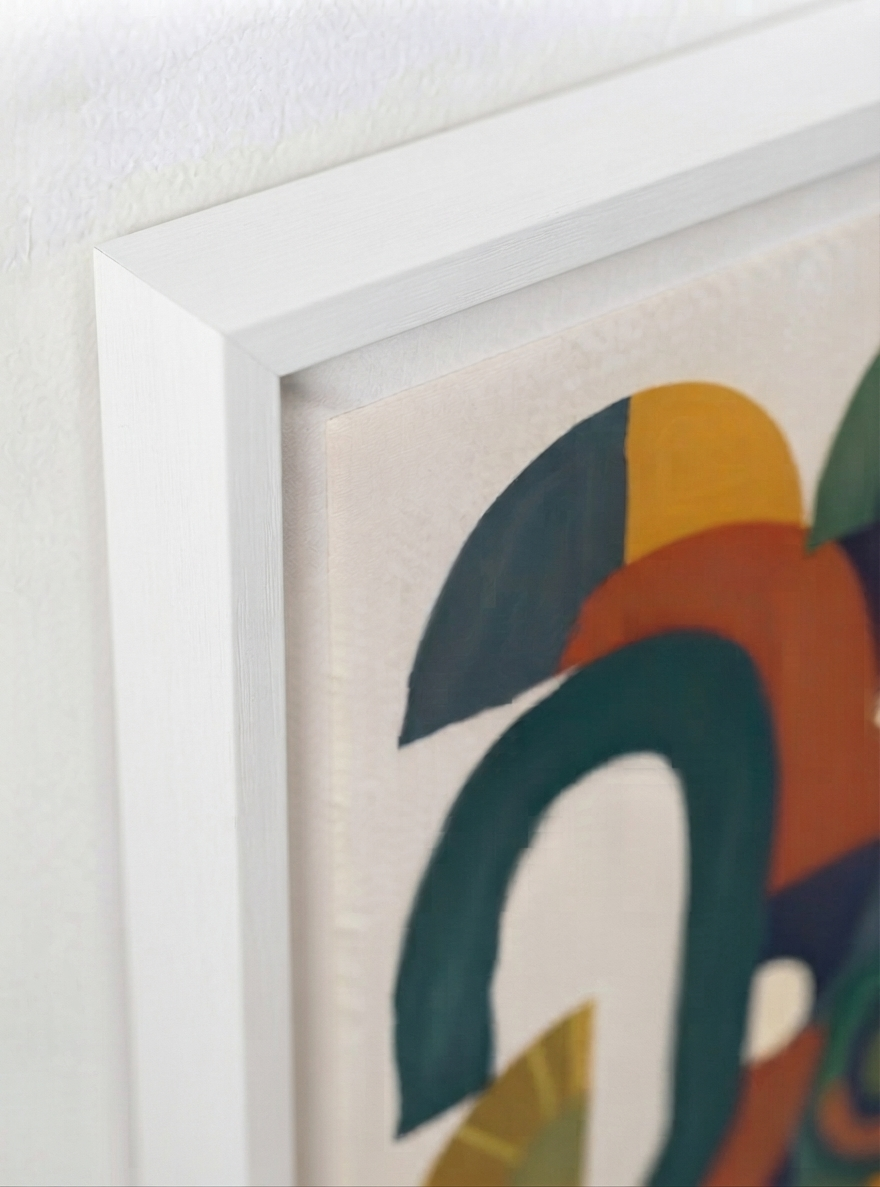 A close-up of a framed Bauhaus Abstract Geometric Wall Poster inspired by vintage modernist art print traditions and painted by Francis Phylae for Phylae Posters with bold geometric shapes in teal, orange, mustard yellow, and dark blue on a textured off-white canvas, set in a white frame against a white wall.