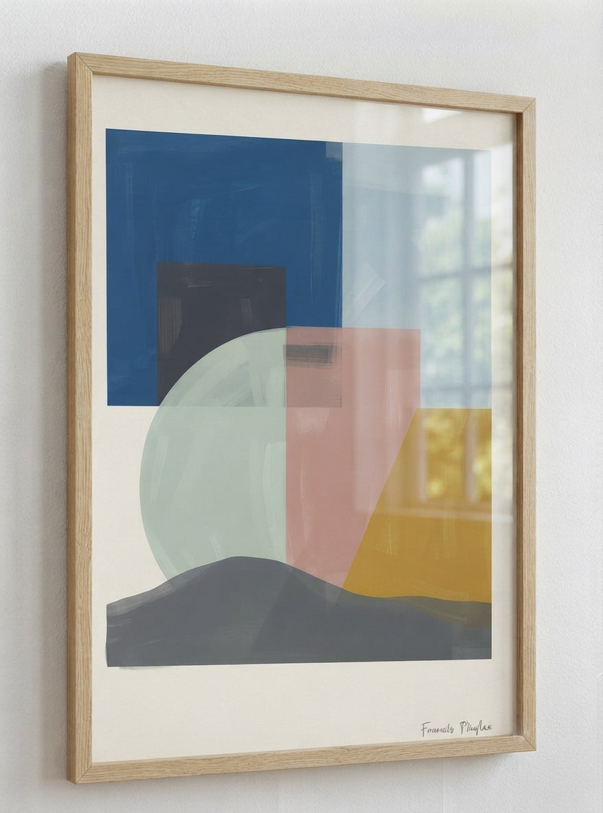 A framed Mid-Century Modern Geometric Landscape Art Print with geometric abstract landscape composition and organic modern design by Francis Phylae at Phylae Posters featuring blocks of blue, pink, yellow, gray, and pale green on a cream background, housed in a light natural wood frame and hung on a white wall.